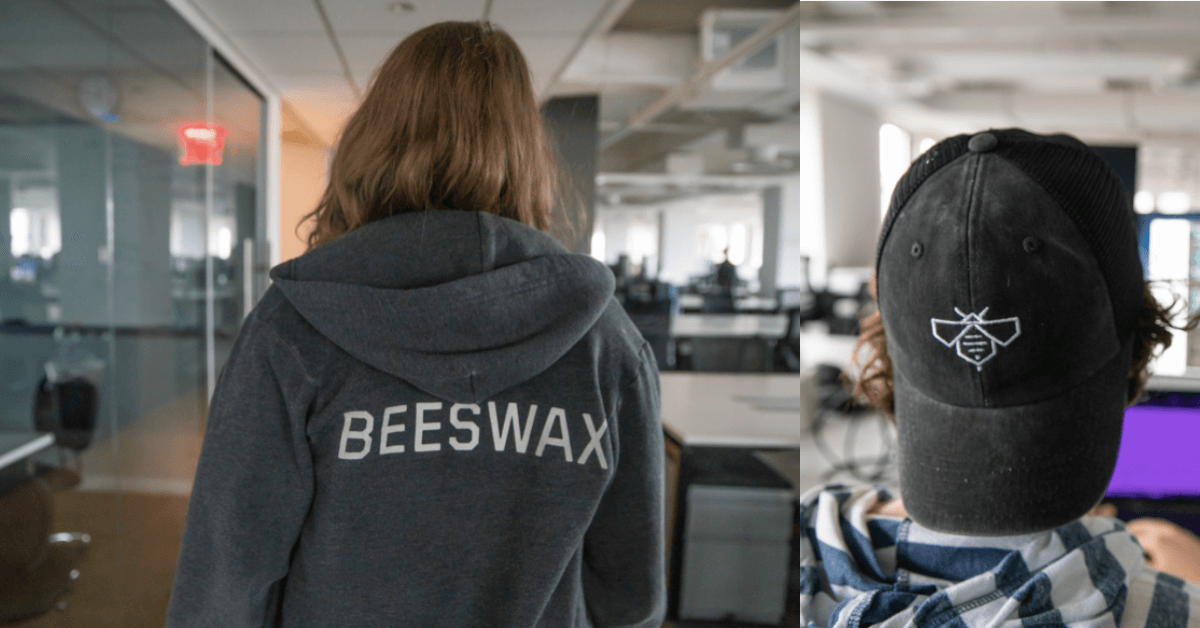 Beeswax branded swag, including jumpers and caps.